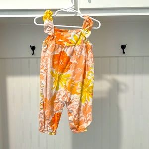 6mo romper . Spring floral pattern. Stain free. Smoke free home
